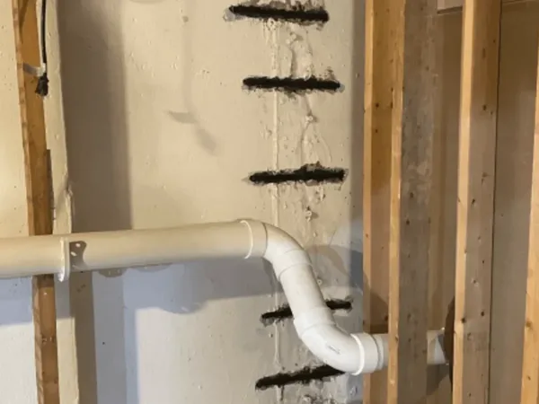 Foundation wall crack repair completed with injection ports