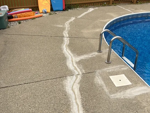 Completed concrete pool-deck crack repair in Franklin