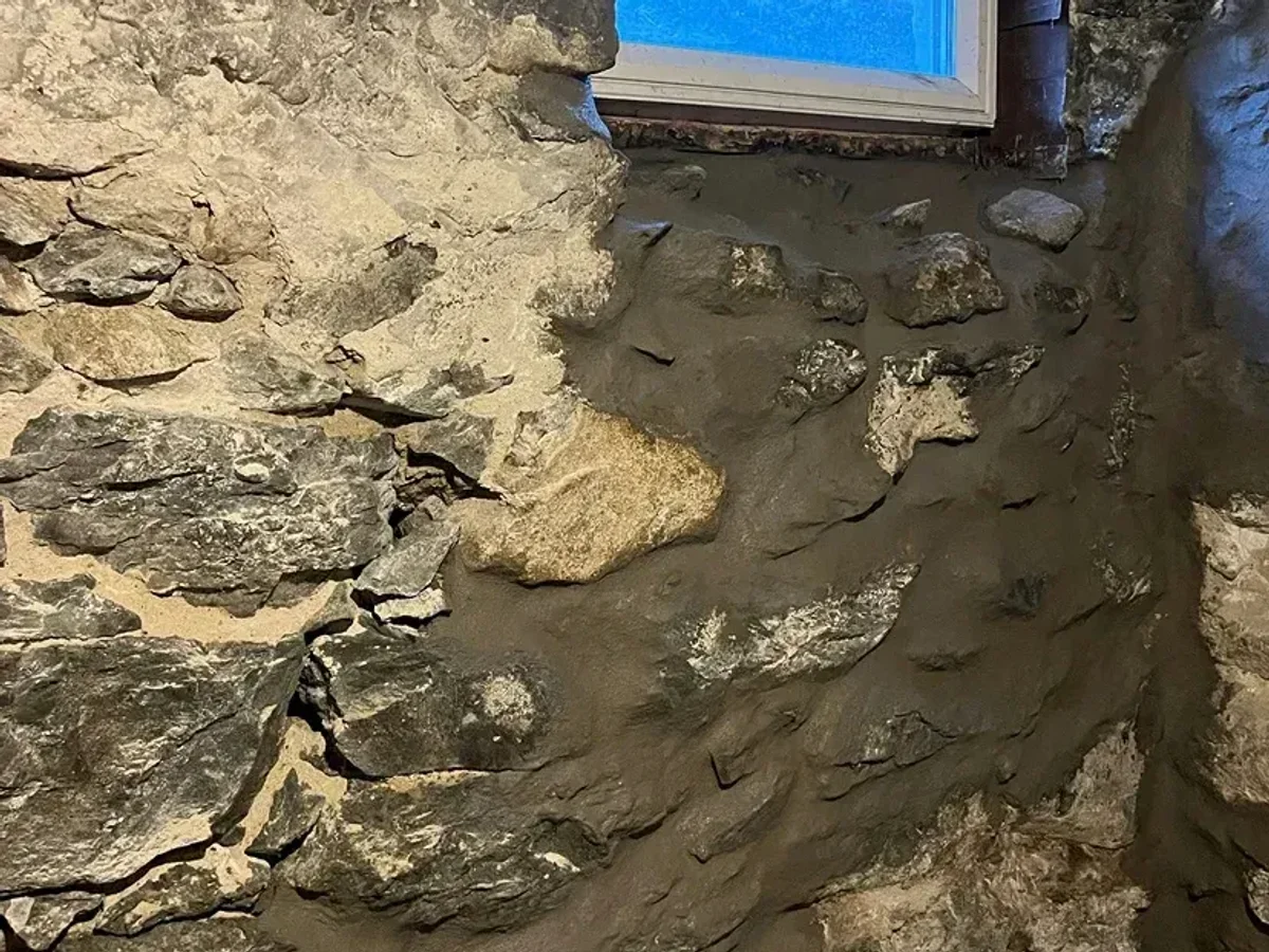 Stone foundation deterioration before repair